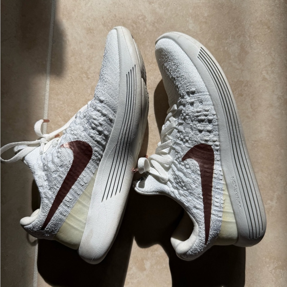 Nike White and Rose Gold Sneakers